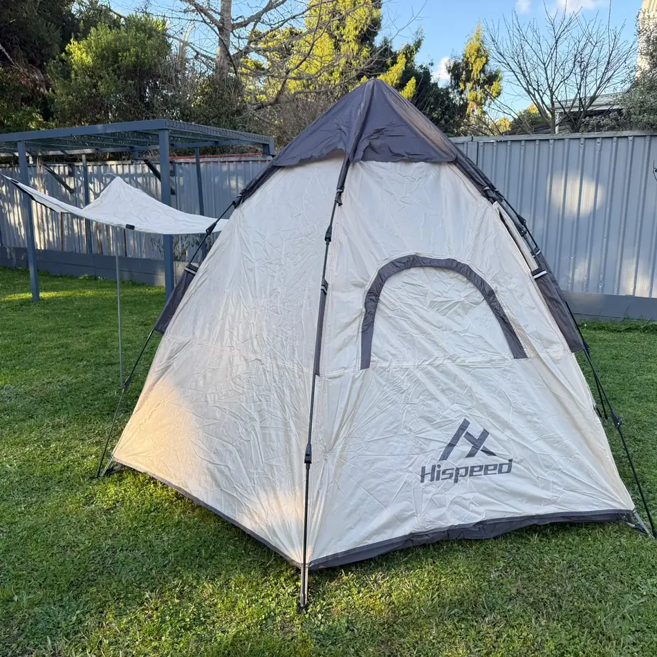 Double-Layer Hexagon Tent in Cream, set up in an Auckland backyard