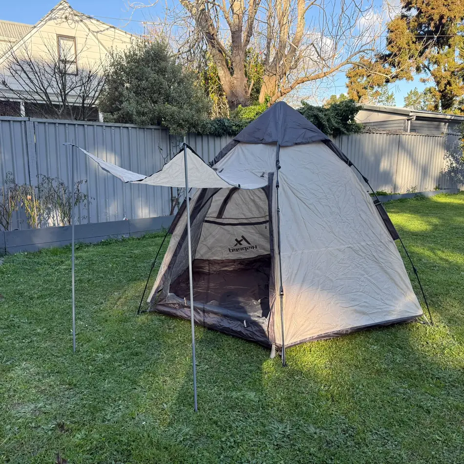 Double-Layer Hexagon Tent in Cream, set up in an Auckland backyard