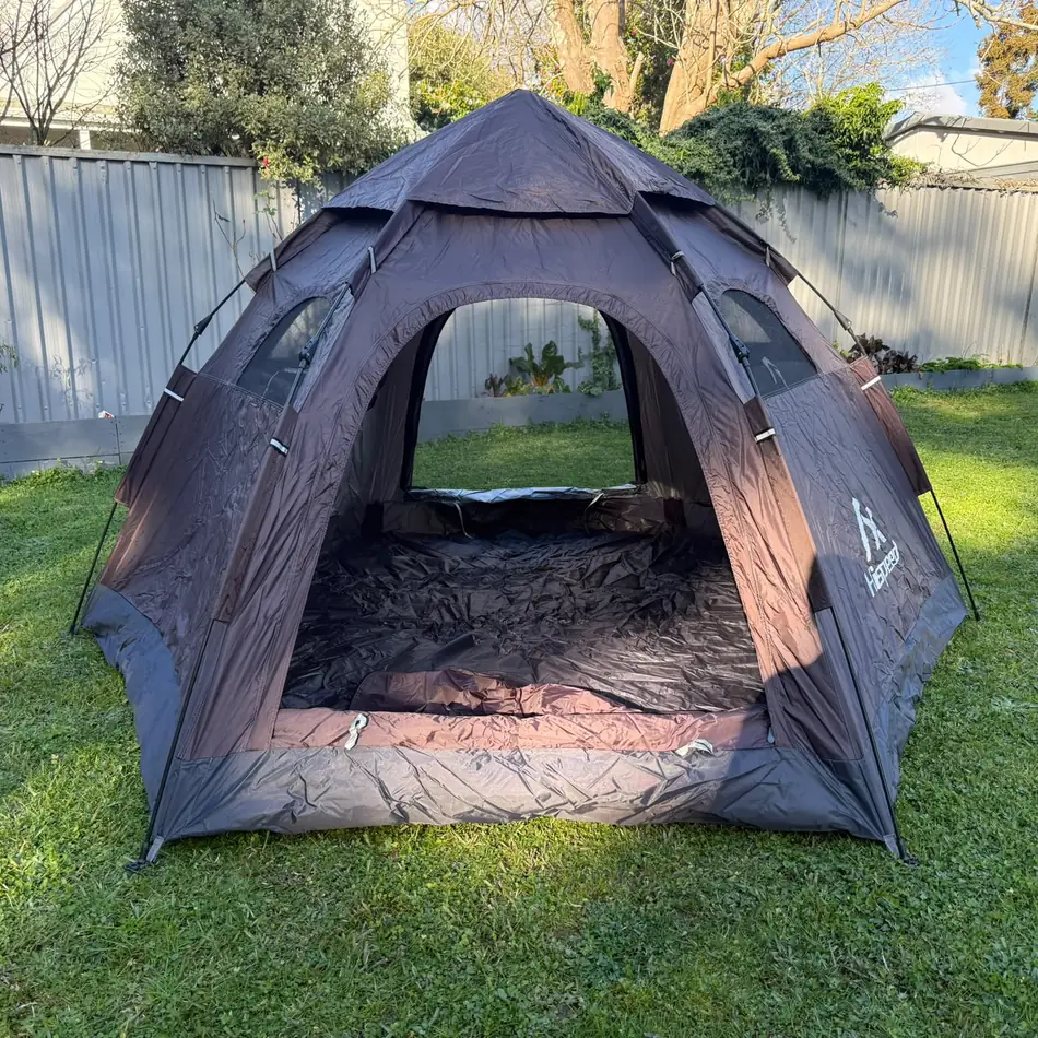 Quick-Pitch Hexagon Tent set up in an Auckland backyard