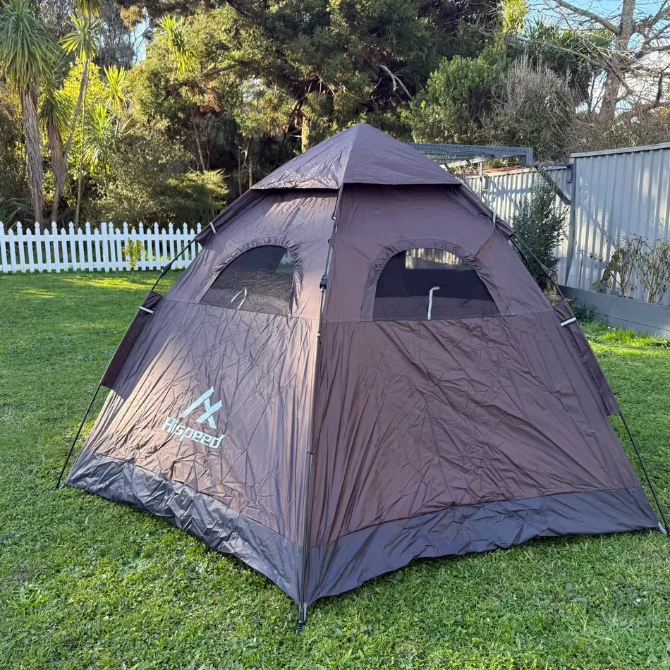 Quick-Pitch Hexagon Tent set up in an Auckland backyard