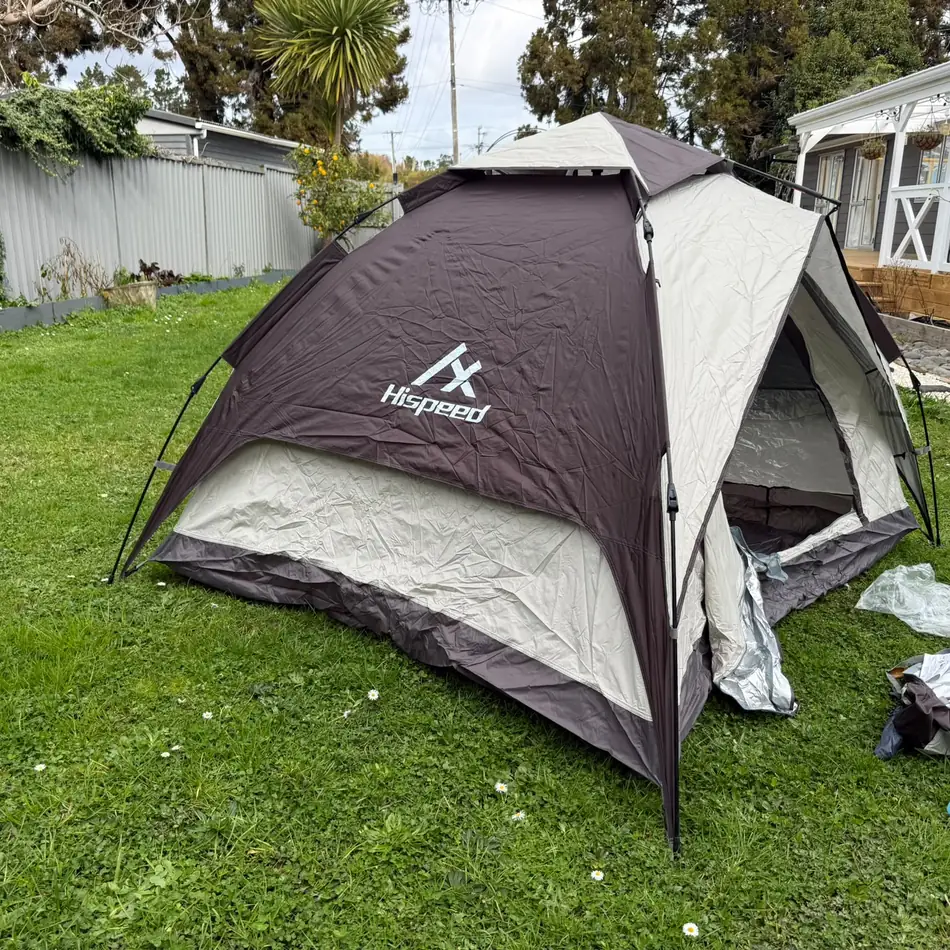 Quick-Pitch Dome Tent set up in an Auckland backyard